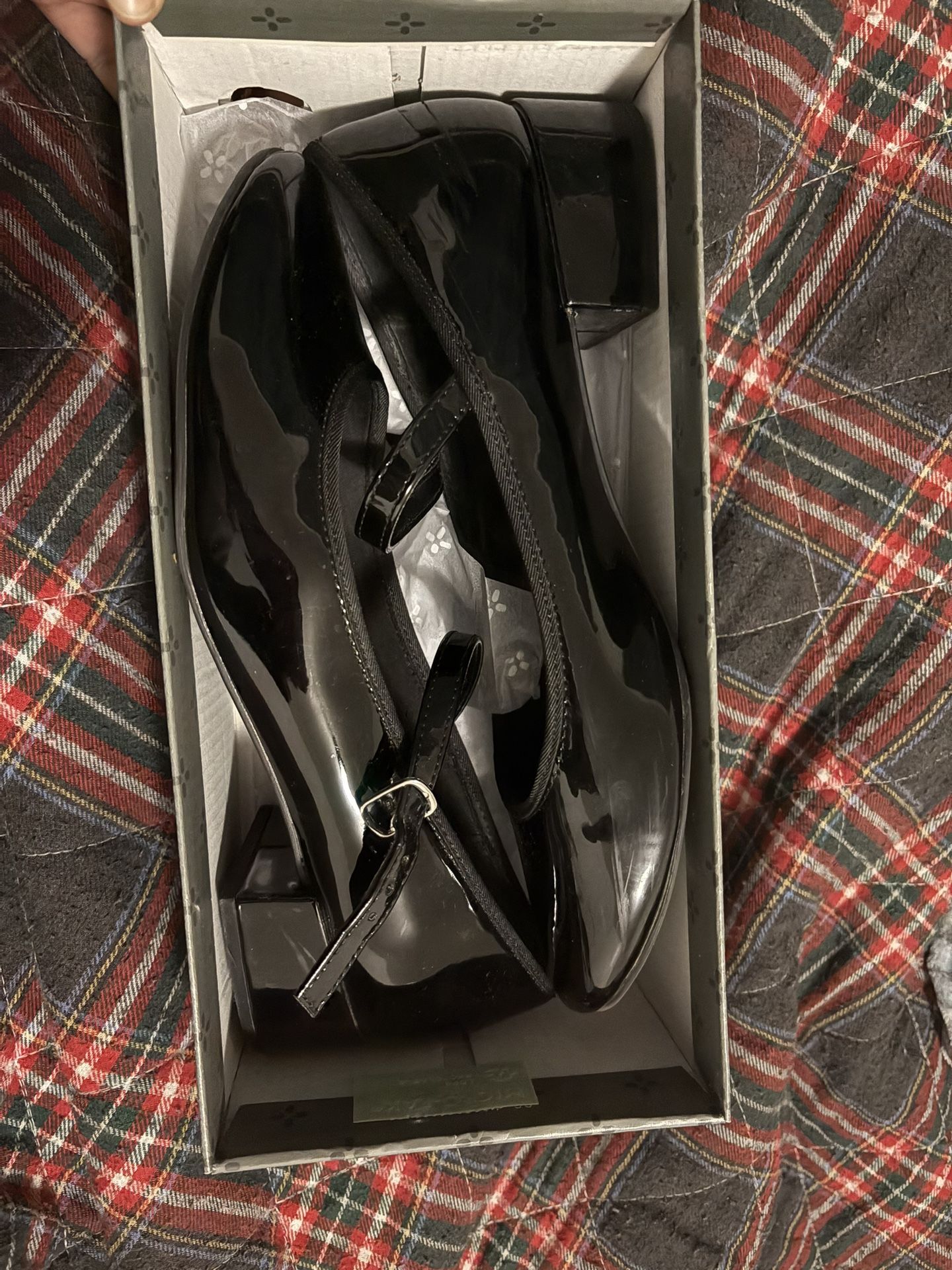 black patent leather Mary Jane’s