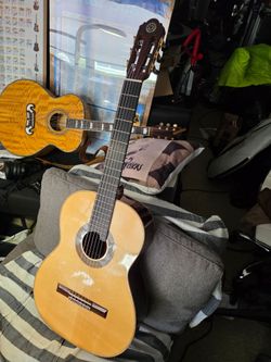 Set of 4 Illuminati Custom Guitars