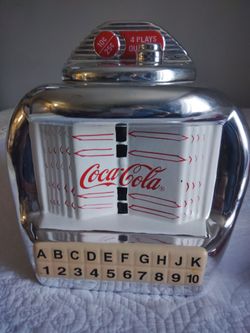 Coca Cola cookies jar, salt and pepper shakers glasses and cups