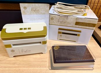 Anna Griffin Empress Mini Die & Emboss Machine, like new!  Includes all original box extras plus a stash of new dies & stamps & a large paper pad!