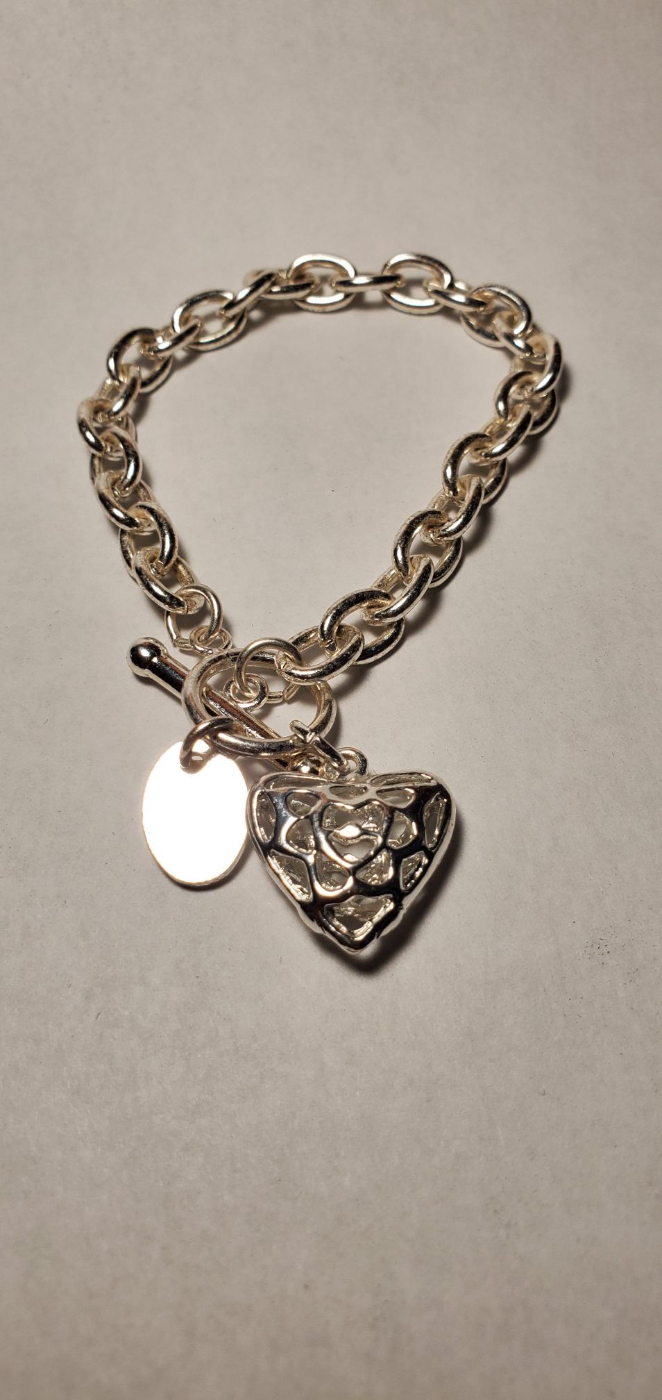 Silver Tone Bracelet with heart pendant