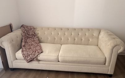 Tufted sofa cream