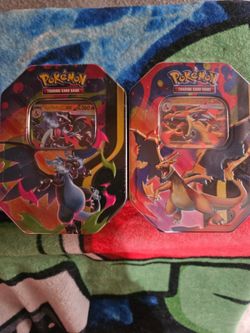 Sealed Charizard x and y tins