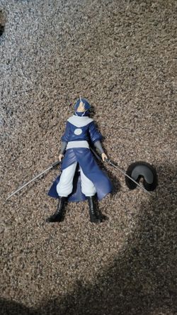 Figures, Stuffed Animals And A Cup