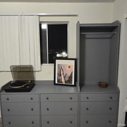 grey dresser and open wardrobe set