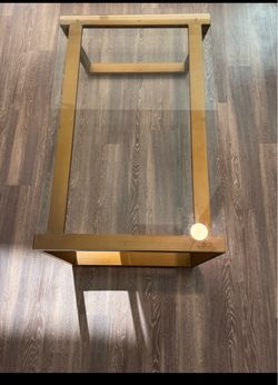 Elegant Glass-Top Coffee Table with Gold-Tone Frame