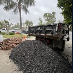 mini bobcat/dump trailer