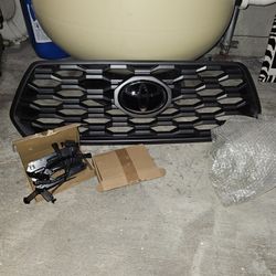  160 Parrilla Delantera TOYOTA TACOMA  2016  2021 OEM