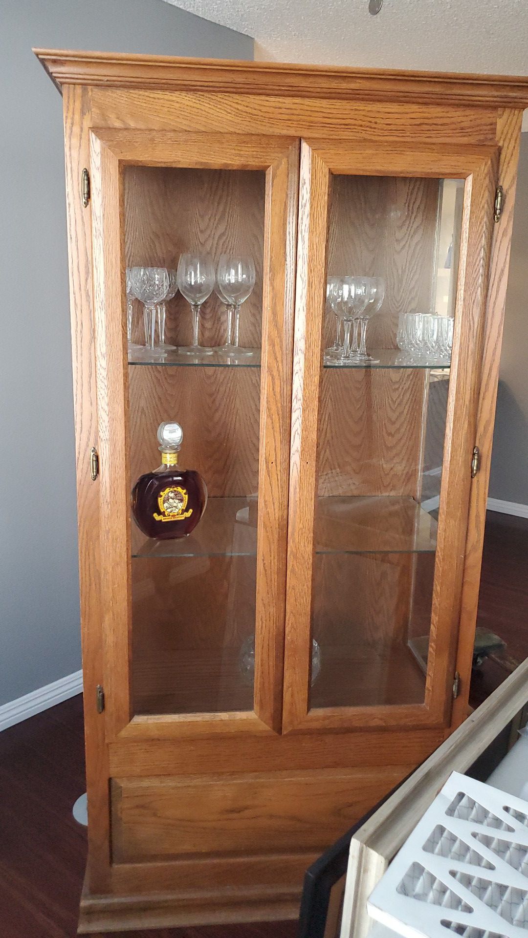 Curio cabinet and Lazy boy free to good home