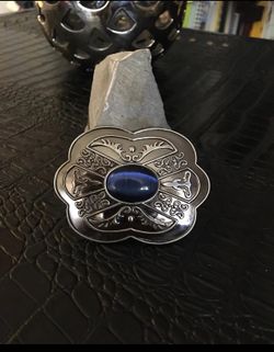 Pewter color belt buckle with blue stone