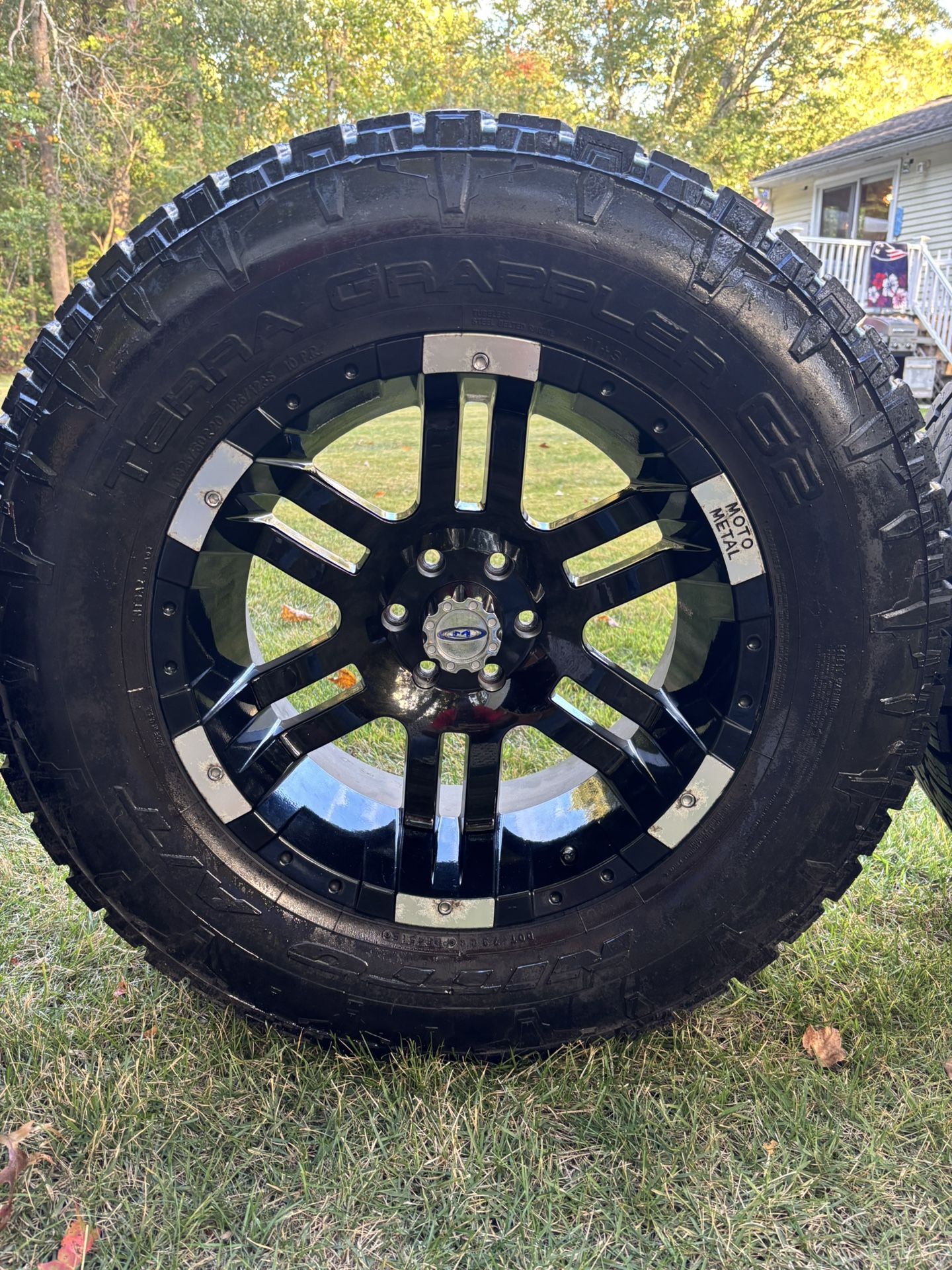 20" motometal wheels. 325x60r20 nitto terra grapplers.
