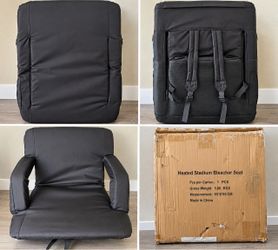 Heated stadium seat