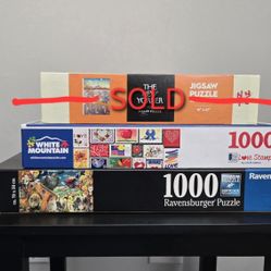 2 jigsaw puzzles, each 1000 pieces 