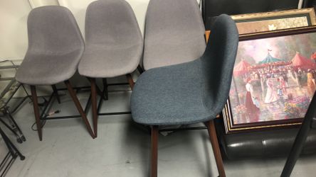 4 high chairs 3 of them 24” high and the blue 28” high new stools chairs never used