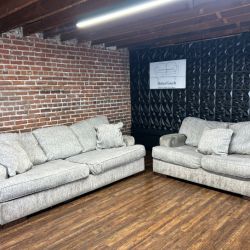 Delivery Available Ashley gray oversized sofa/couch + loveseat