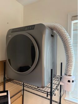 Like new. Electric dryer and portable washer