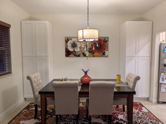 Orange Area Rug with Flower Design