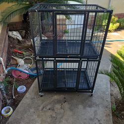 .$75     2 Tier Dog Crate On Casters
