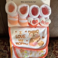 6-9 m baby girl clothes , 0-9m bib and sock set, w/ 0-3 m  baby rags and pacifiers 