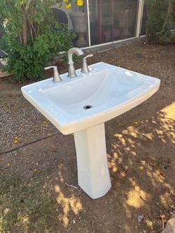 Bathroom vanity sink pedestal with faucet