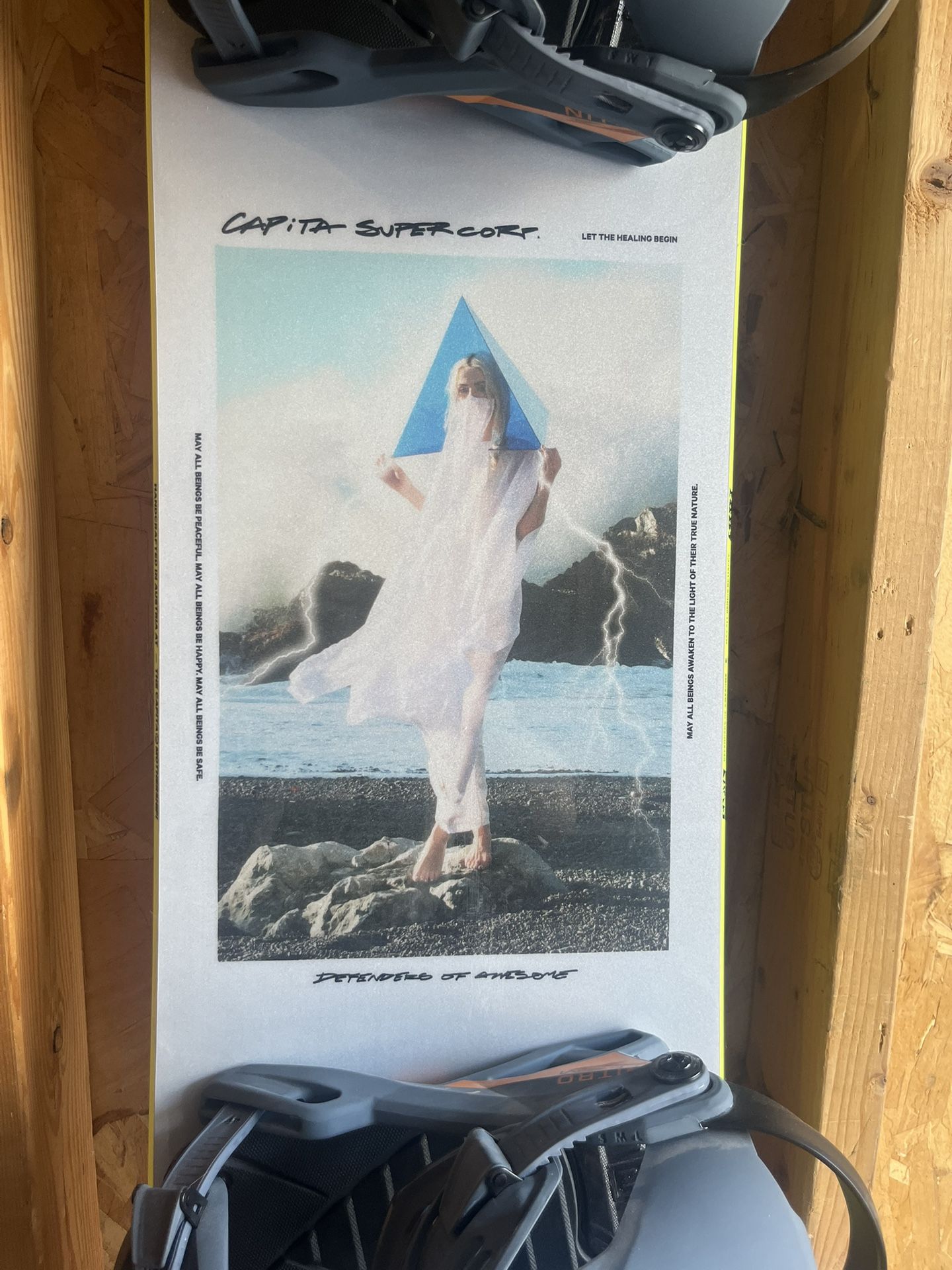 Brand new Capita snowboard with nitro team bindings and vans Aura pro snowboard boots