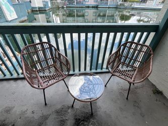 Outdoor wicker chair set of two with glass tablef