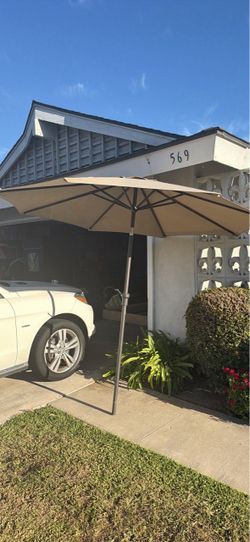 Umbrella (8'- Tan) we have 2 available