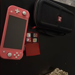 Nintendo Switch lite (PINK) with case and games 