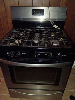 Good condition working refrigerator and stove