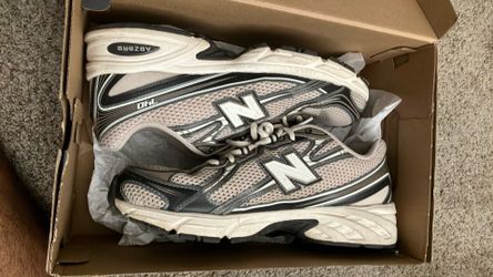 Grey and brown new balances