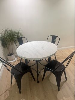 Round Dining Table & Black chairs