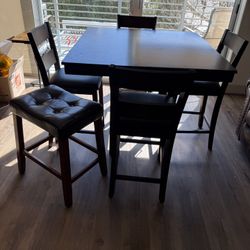 Table 36 Inches High, 40X40 Inches Wide And 5 Chairs 