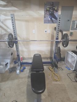 Weight bench/rack w/ Olympic bar/350# plates