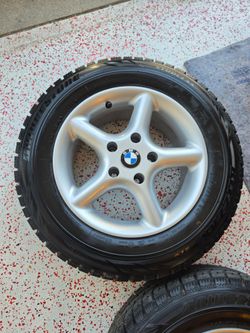 New 15 inch BMW rims wheels w new Bridgestone Blizzak tires 5x120