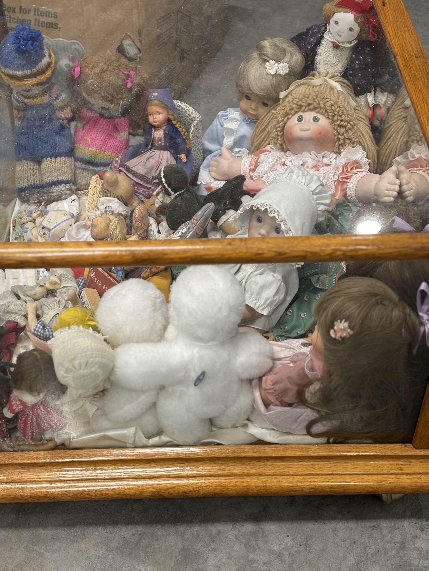 Vintage Dolls in wood & glass case