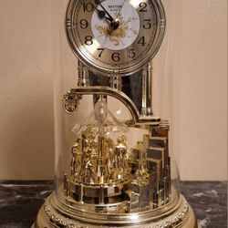 ANTIQUE RHYTHM QUARTZ CLOCK WITH SPINNING DANCE BALL - MADE IN JAPAN 