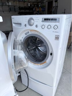 LG Washer and Dryer with pedestals