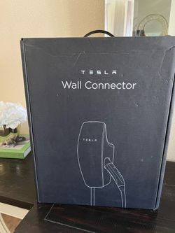 Tesla wall charger and portable charger