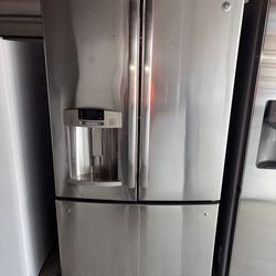 GE Stainless Steel Refrigerator And Freezer