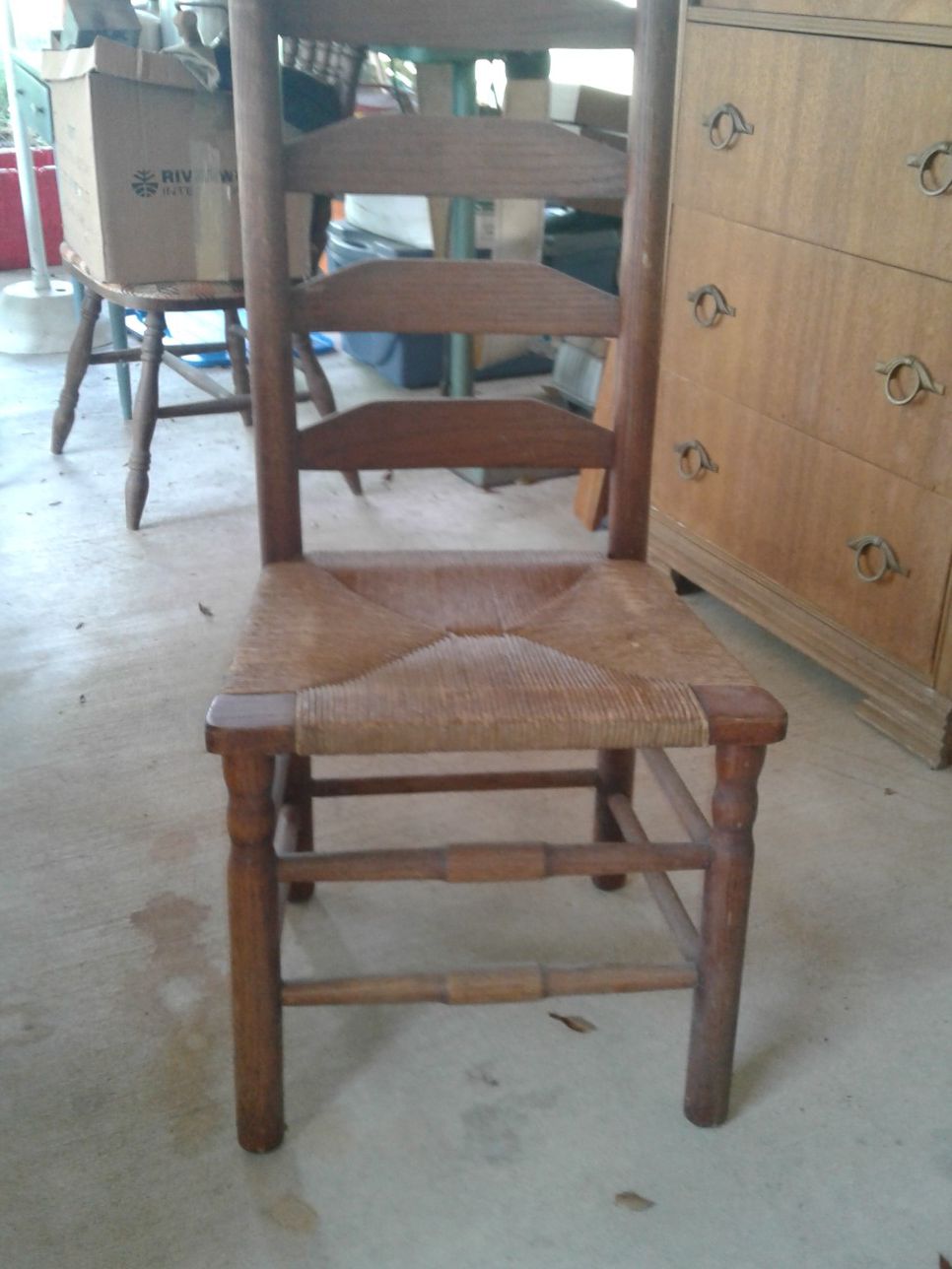 Antique ladder back wicker chair