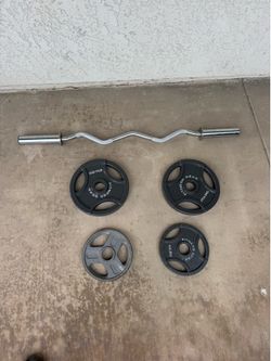 Weightlifting Curl Bar and 70 lbs plates