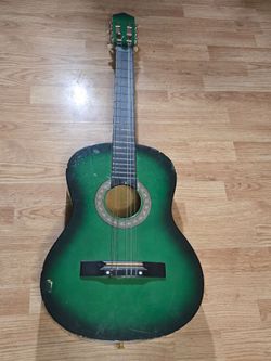 Green acoustic guitar