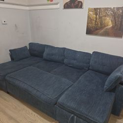 Blue chenille sectional w/storage & convertible bed