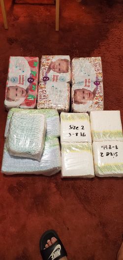 Assorted size 2 diapers (honest,pampers,LUV)