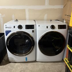 GE Large Stackable Steam Cycle Vented Electric Dryer And Washer (White )