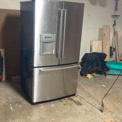 LG.  Refrigerator.  And Working In Conditions.