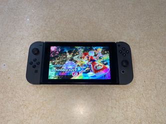 NINTENDO SWITCH + 120 SWITCH GAMES