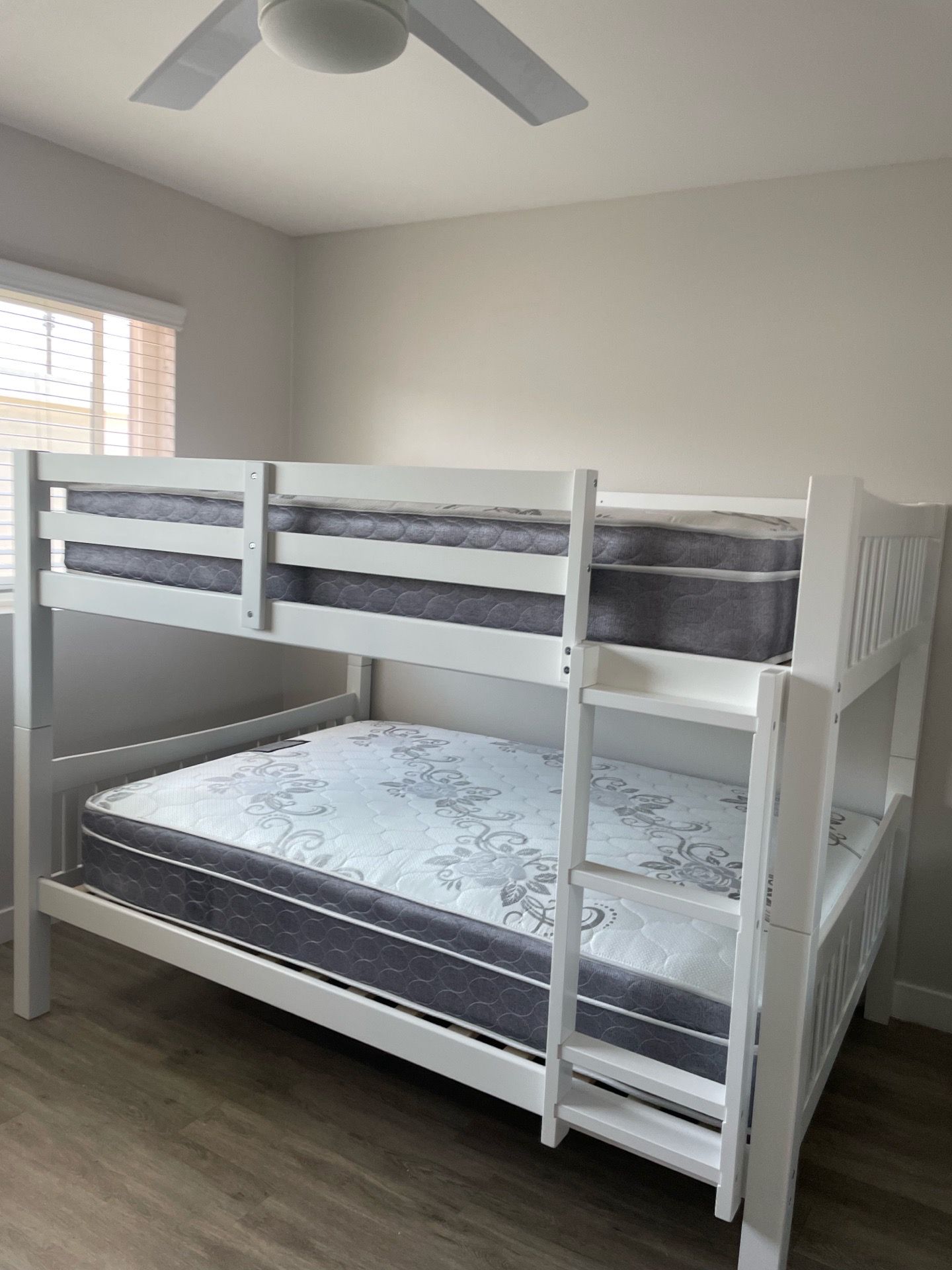 Full over Full bunk bed. Dark walnut,grey & white-$499. Full mattresses -$125.00 each. Assembly not included. Taxes included. Free delivery. Se habla
