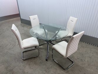 Dinner table with chairs