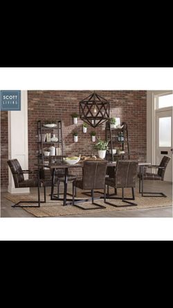 Dining room table with four side chairs and two armchairs